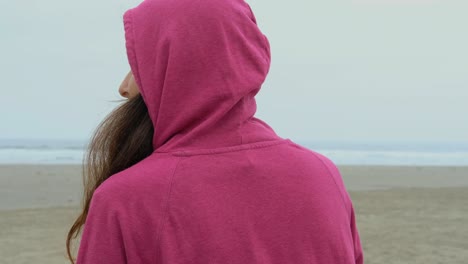 girl at the beach back view and profile