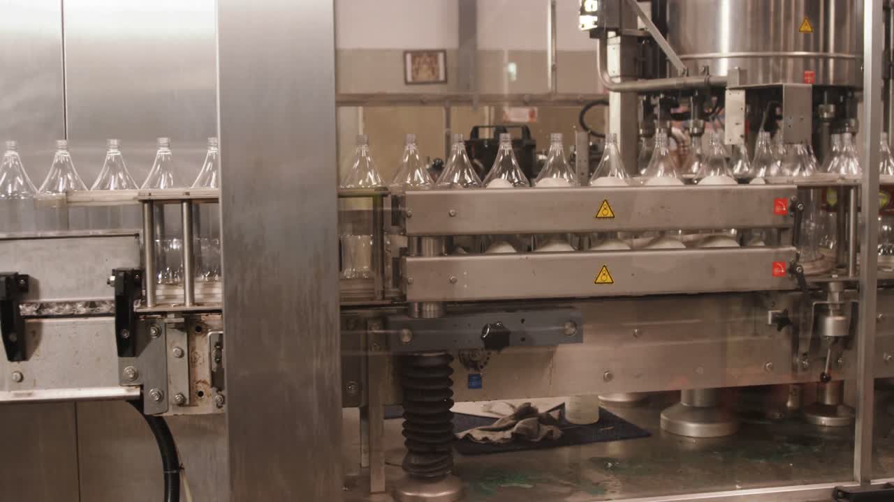 Bottles moving in production line