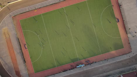 aerial view of a hockey court at sunset