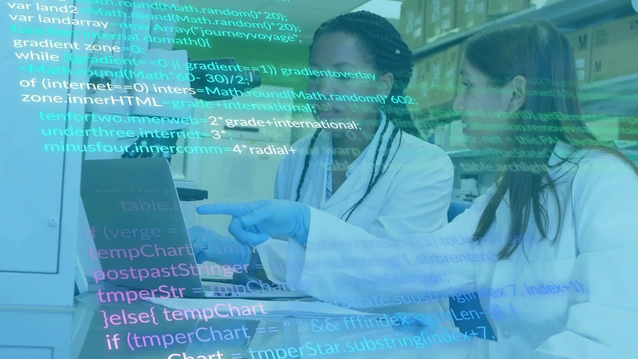 Two researchers pointing at laptop in lab, reviewing data as code overlay scrolling across screen