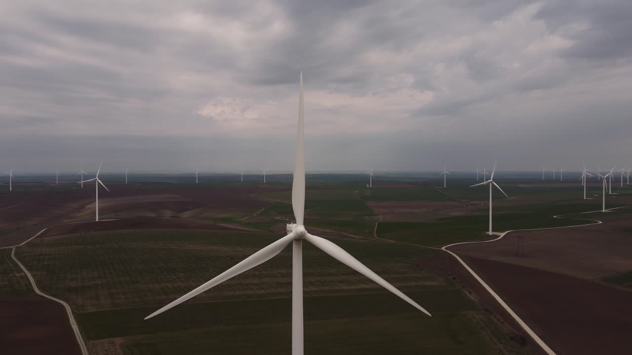 Aerial View Of Clean And Renewable Wind Power Farm On A Cloudy Day