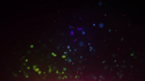 Animation-of-colourful-spots-floating-over-black-background