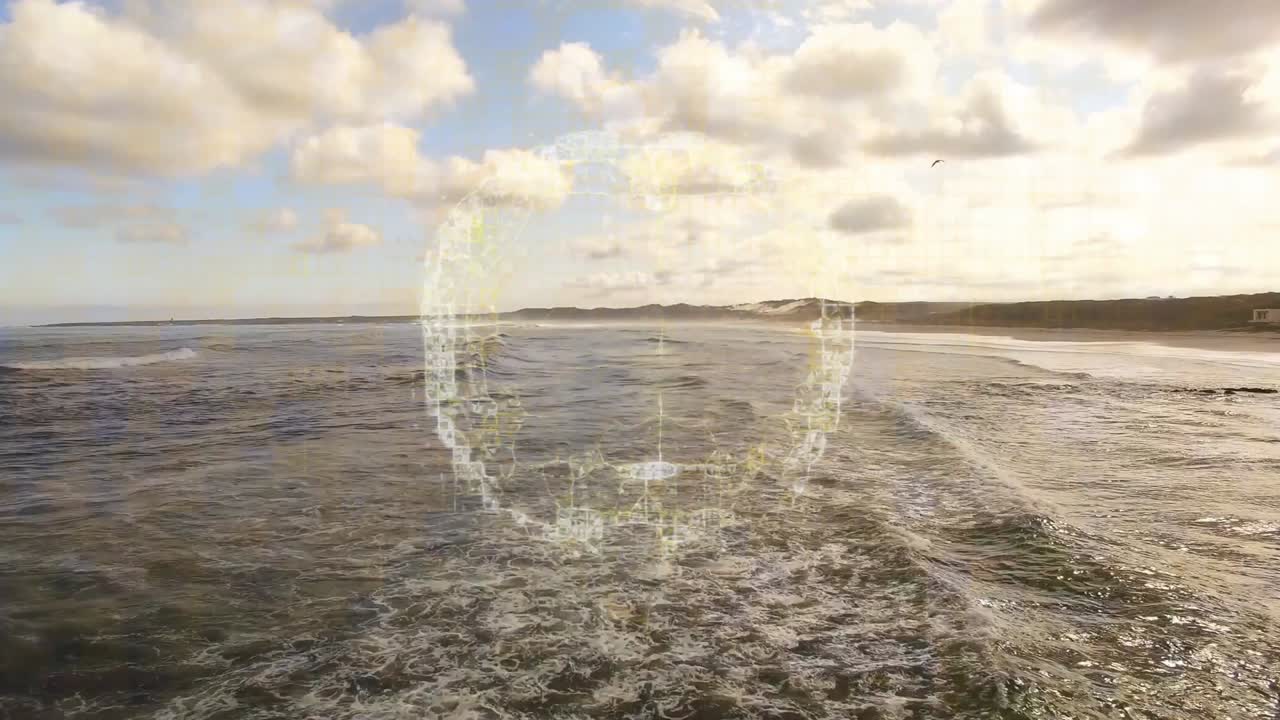 Havbølger, der møder en sandstrand, med et digitalt netværksanimations-overlay.