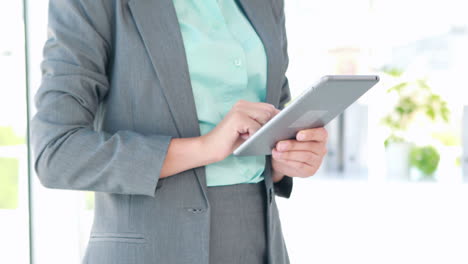 Business-woman-using-tablet-computer-