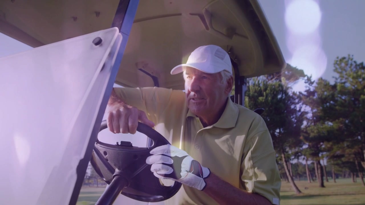 Senior golfer heading to cart adjusting knob donning glove readying drive with bokeh overlay