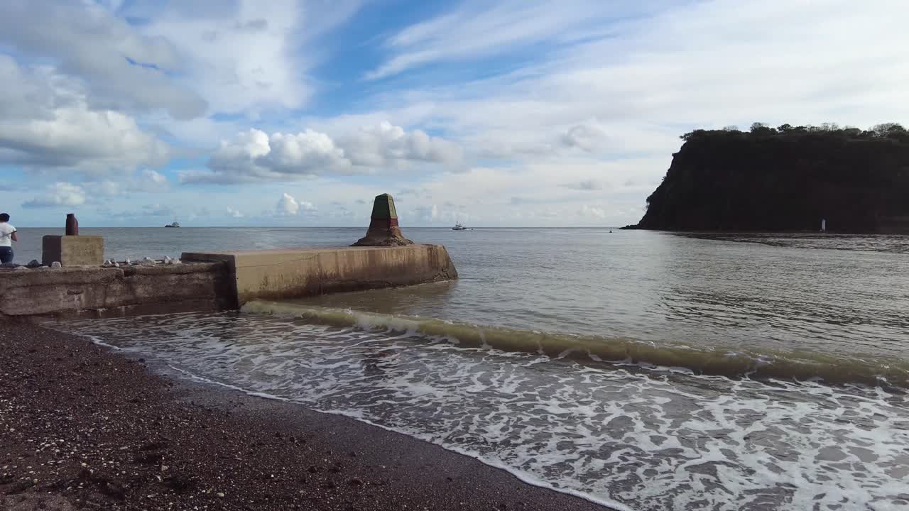 Panning left shot of the River Teign estuary looking towards Ness Cove in Devon