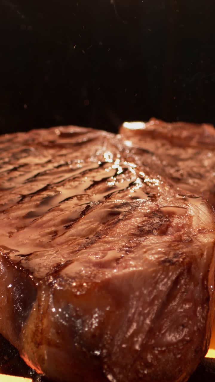 Close-up of Grilling Steak with Seasoning