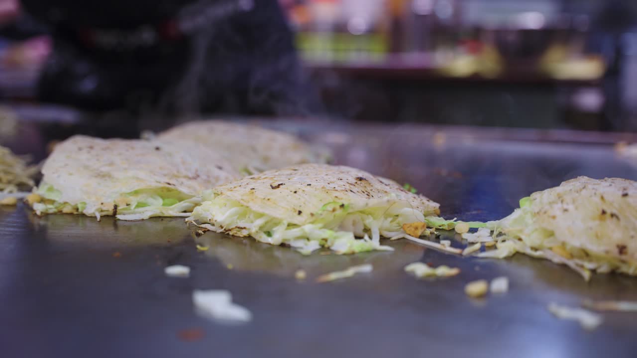 Okonomiyaki, Japanese Vegetable and Noodle Pancake On Teppan Grill