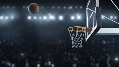basketball hit the basket in slow motion on the background of flashes of cameras