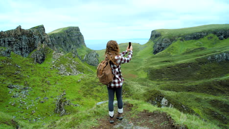 woman hiking in scottish highlands