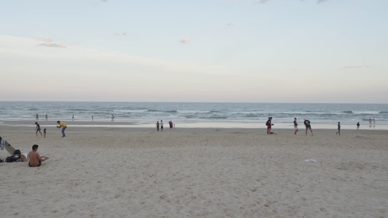 Australia Gold Coast beach with people in afternoon, calm sea waves