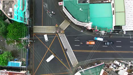 top down aerial view of intersection and crossing lane