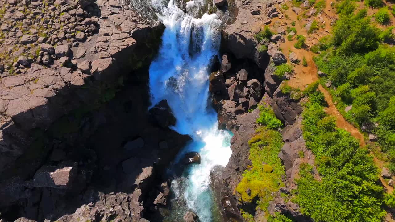 Explore the hidden gems of Egilsstaðir from above, where rolling hills and pristine lakes create a captivating tapestry of Iceland’s stunning wilderness.