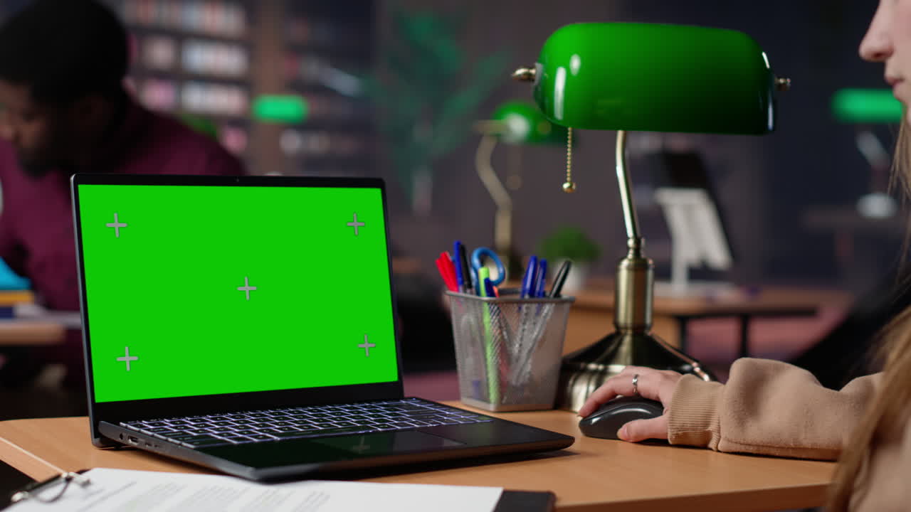 Student uses mockup display while doing research for exam preparations