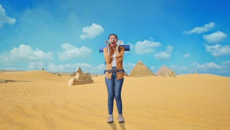 full body of asian female hiker with mountaineering backpack saying wow while traveling in pyramid of giza