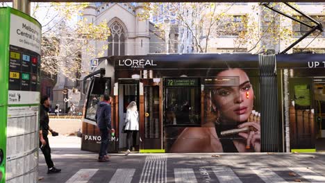 tram arrives at melbourne central station