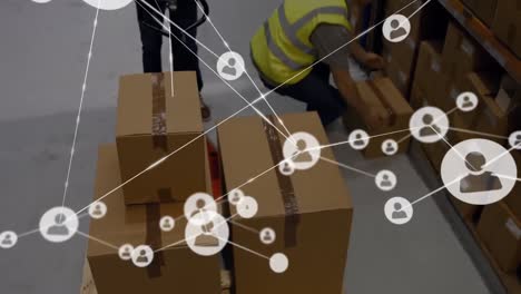Digital-composite-video-of-network-of-connections-against-man-working-in-warehouse