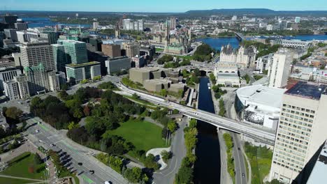 aerial view of downtown ottawa with parliament in the background and the canal and ottawa river