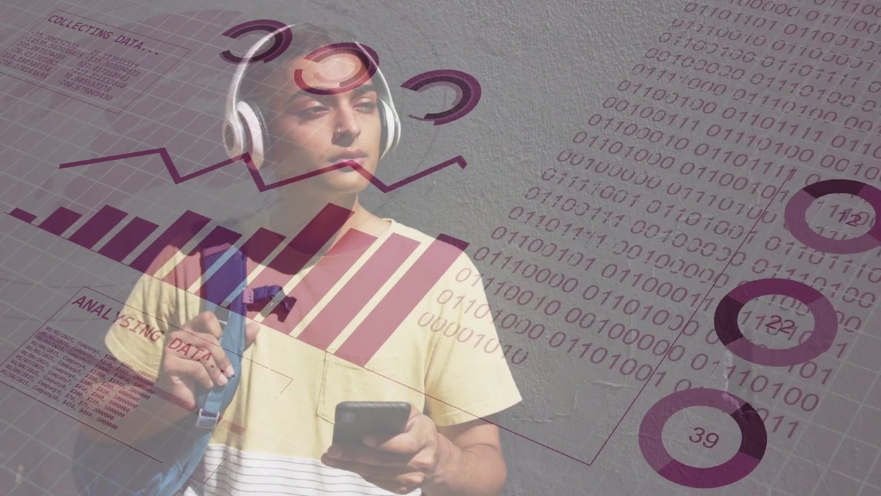 Adult male standing by grey wall, tapping phone and checking finance data while charts growing
