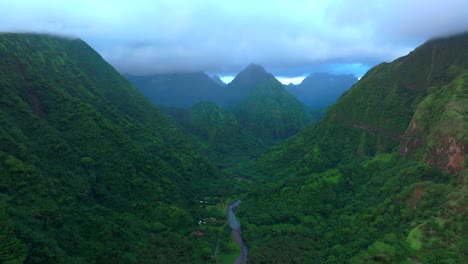 Vallee de Tautira Bay River village Tahiti island French Polynesia aerial drone cloudy morning sunrise towering jagged mountain peaks valley Teahupoo Mont Rauiri Aorai Taiarapu Taravao forward upward