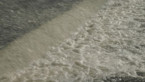 The-fast-splashing-water-stream-of-a-weir