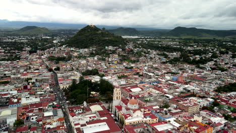 aerial view of atlixco convent and mountains