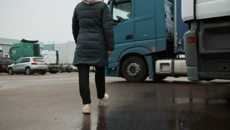 truck driver getting in truck