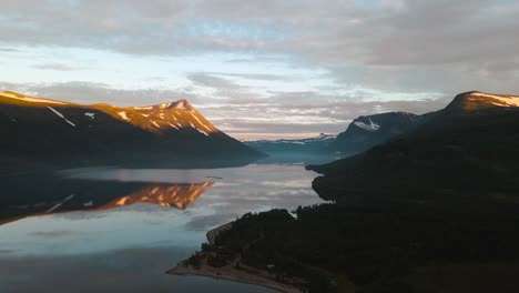 Beautiful-Lagoon-And-Beach-Surrounded-By-Trollheimen-Mountains