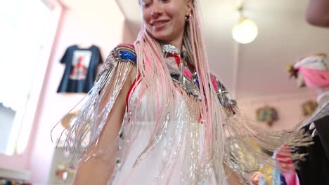 a woman is modeling clothing at a store