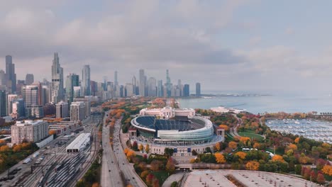 estadio soldier field de chicago vista aérea con el centro de la ciudad en el fondo