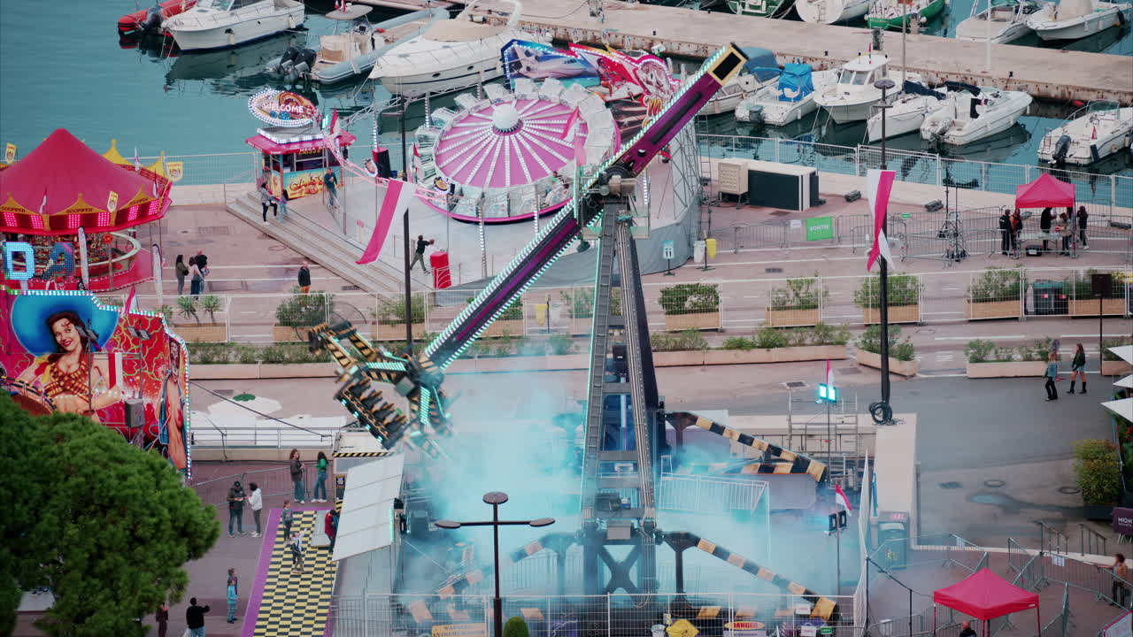Aerial view of the Port Hercule Funfair in Monaco in daylight