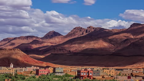 cinematic timelapse of moving clouds and shadows falling on the high atlas mountain of tinghir town, the moroccan crown jewel