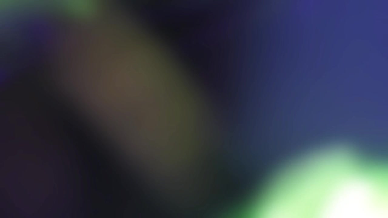 Dynamiske grønne og lilla linseflares med bokeh-effekt