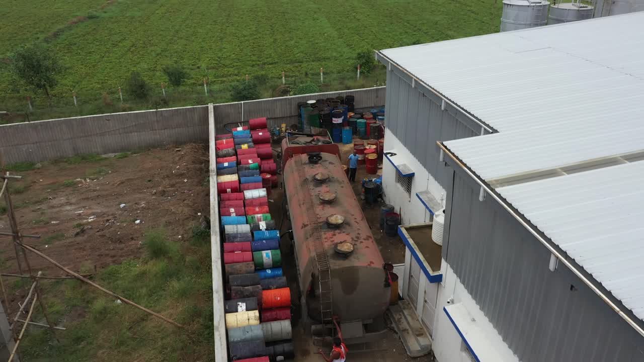 man is looking a lubricant oil tanker, industry 5.0