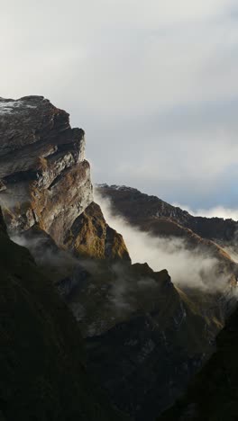 vertical rugged rocky mountains scenery, sharp rocks and rugged mountain landscape close up, vertical video for social media instagram reels and tiktok of himalayas in nepal