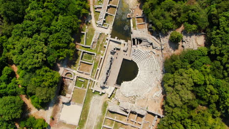 shot drone cenital butrint roman amphitheater and ruins in albania