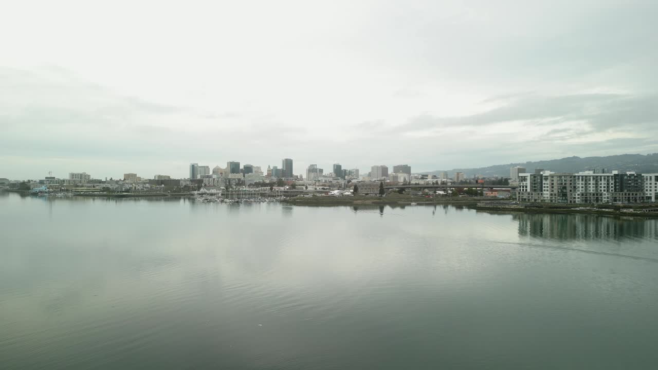 Drone perspective of Jack London Square, highlighting its vibrant outdoor spaces, docks, and proximity to Oakland’s urban core.