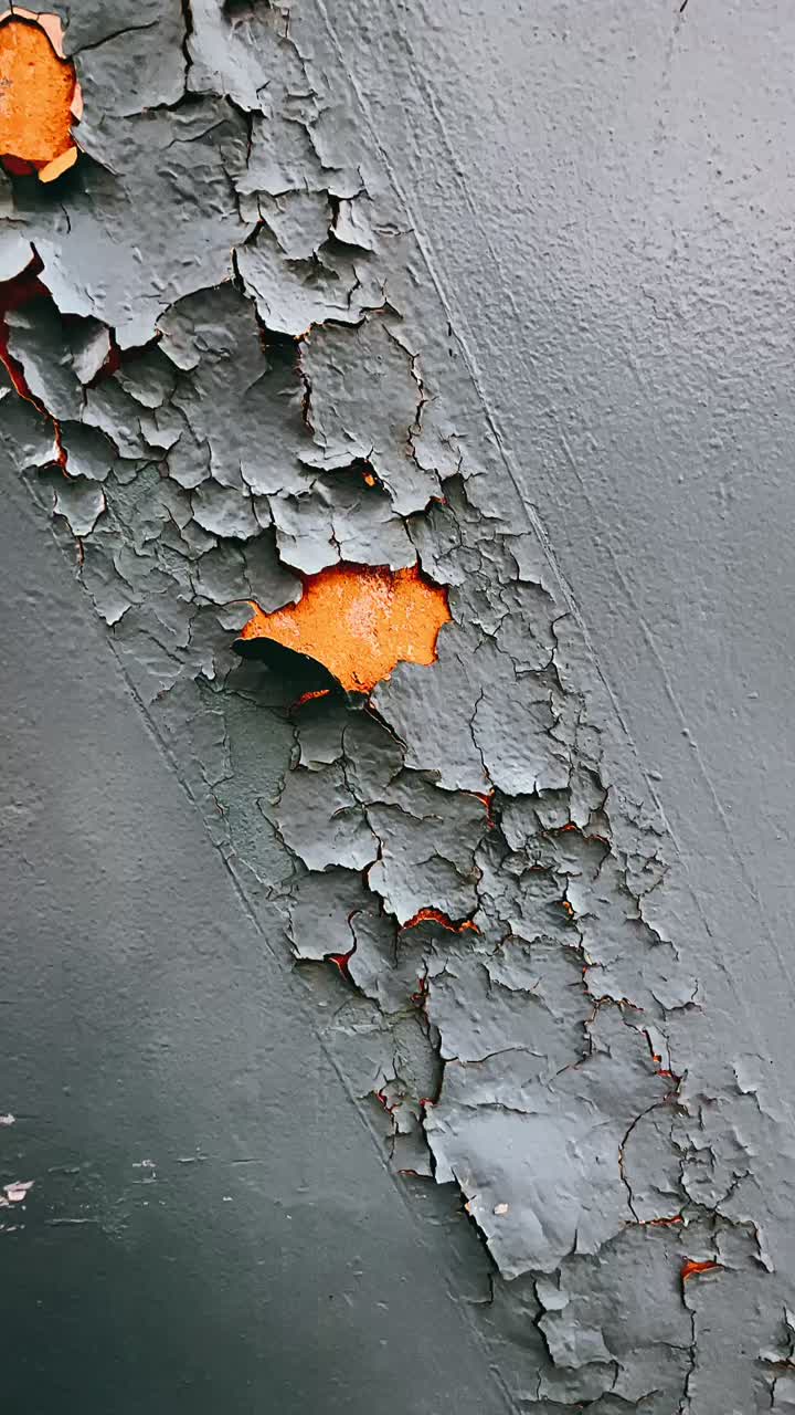 Peeling Paint on a Gray Metal Surface