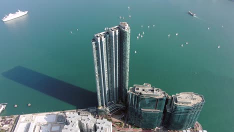 mega residential waterfront building complex in hong kong bay, aerial view