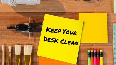 Animation-of-keep-your-desk-clean-text-over-desk-with-stationery