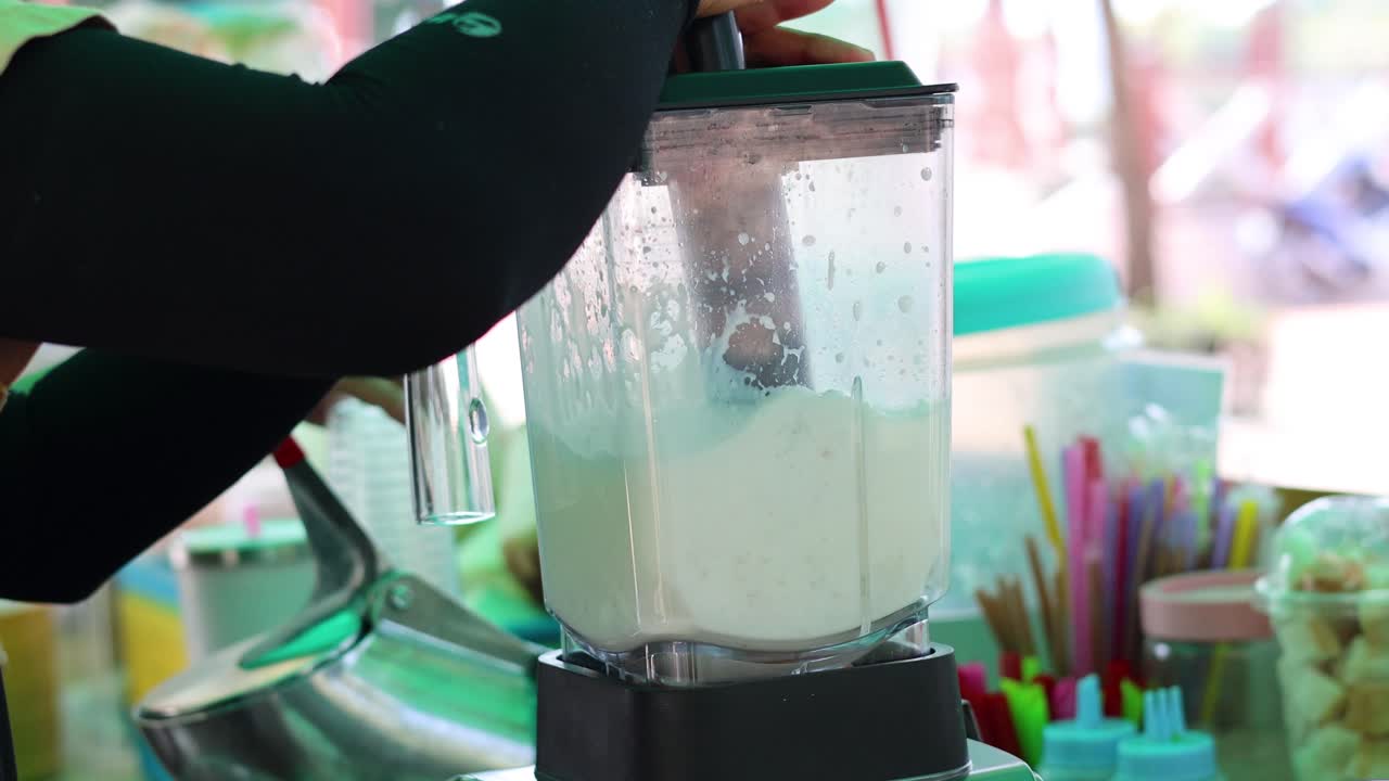 Sequence of a blender mixing ingredients smoothly.