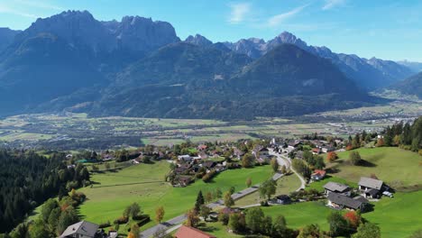 gaital alps and small mountain village near lienz in tyrol, austria - aerial 4k