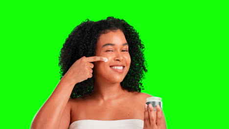 mujer feliz, cara y crema para la belleza en verde