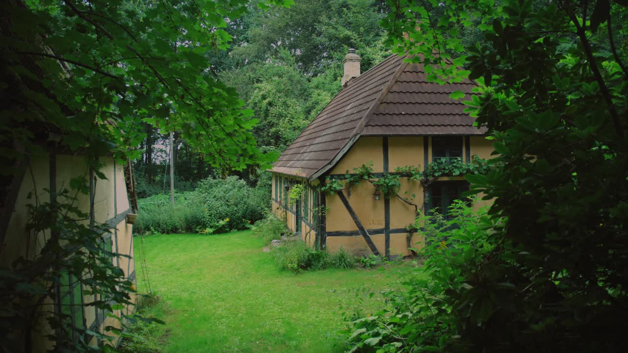Charming cottage surrounded by greenery in Langeland, Denmark, amidst nature