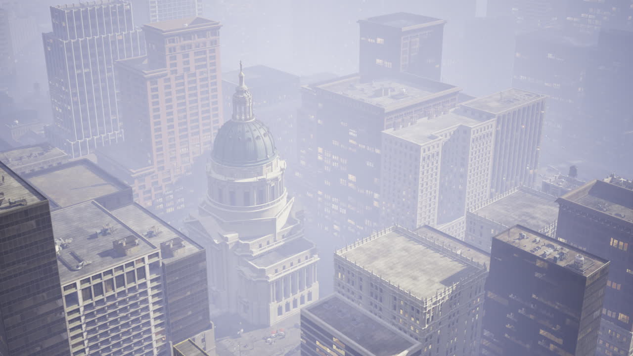 City skyline shrouded in fog with historic building in center