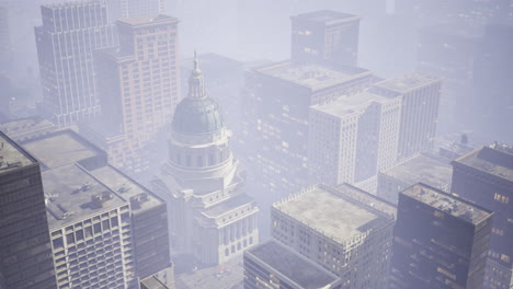 city skyline shrouded in fog with historic building in center