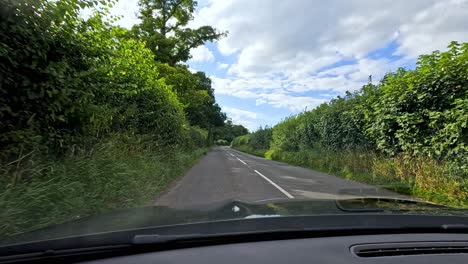 vehicles navigate roadwork signs and barriers