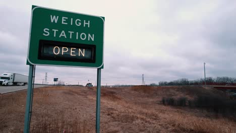 closeup-of-Wigh-Station-road-sign-that-indicates-is-open