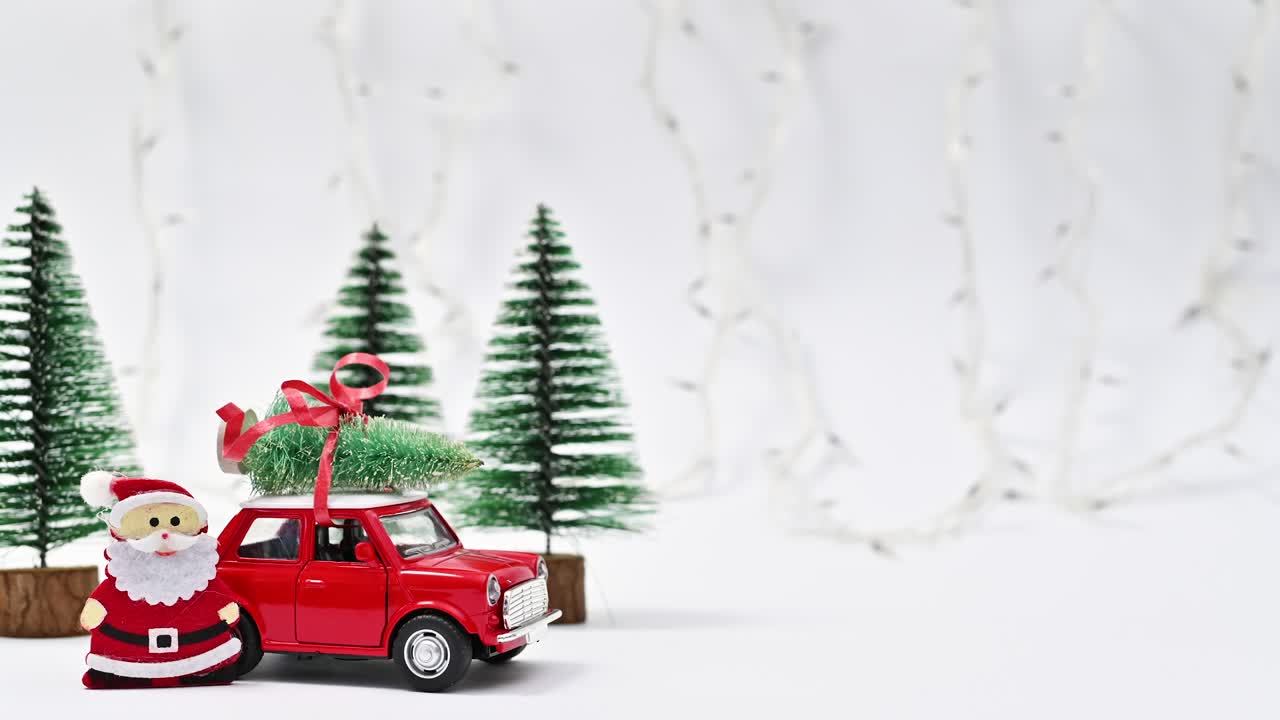 luces parpadeantes en la escena de navidad con santa claus en el fondo blanco. detenga el movimiento