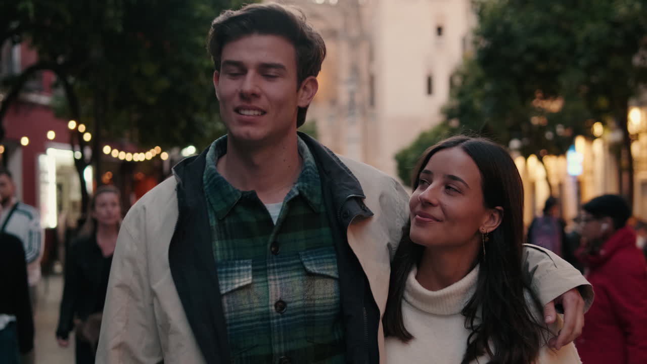 Happy Couple Walking in Seville at Twilight